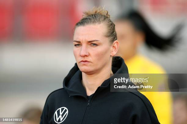 Alexandra Popp of Germany walks out onto the pitch prior to the Women's international friendly between Germany and Brazil at Max-Morlock-Stadion on...