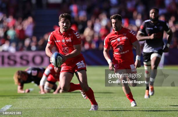 Antoine Dupont of Toulouse breaks with the ball during the Heineken Champions Cup match between Toulouse and Sharks at Stade Ernest Wallon on April...