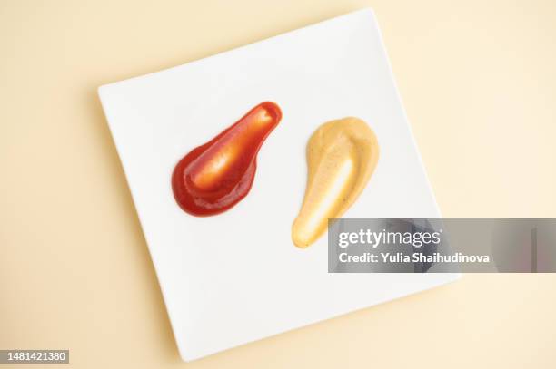 ketchup and mustard - tomato ketchup stock pictures, royalty-free photos & images