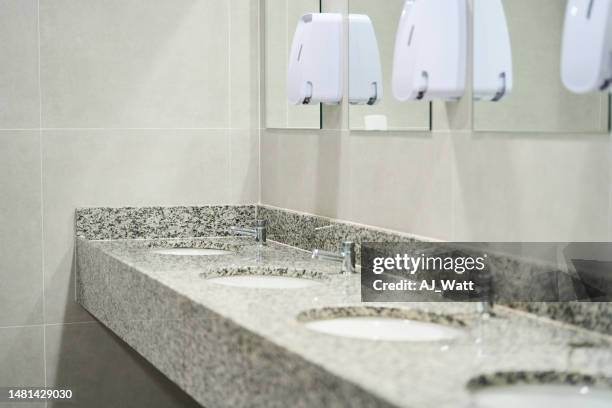 interior of a public restroom - bathroom arrangement stock pictures, royalty-free photos & images