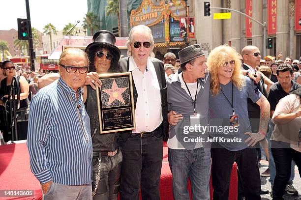 Robert Evans, Slash, Jim Ladd, Charlie Sheen, and Steven Adler pose as Slash is honored with a star on the Hollywood Walk of Fame on July 10, 2012 in...