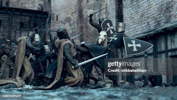 lucha medieval con espadas fuera de un castillo - crusaders fotografías e imágenes de stock