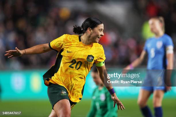 Sam Kerr of Australia celebrates after scoring the team's first goal during the Women's International Friendly match between England and Australia at...