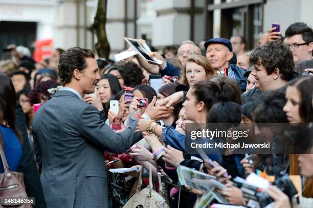 Matthew McConaughey signs autographs outside the Mayfair Hotel ahead of the European Premiere of Magic Mike on July 10, 2012 in London, England.