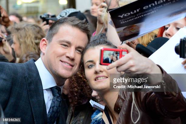 Channing Tatum poses with fans outside the Mayfair Hotel ahead of the European Premiere of Magic Mike on July 10, 2012 in London, England.