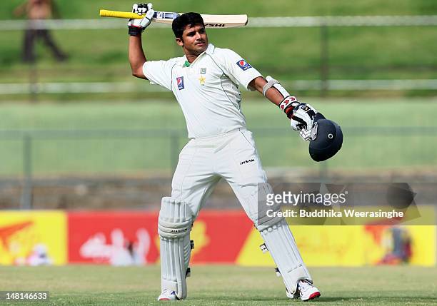 Azhar Ali of Pakistan celebrates scoring a century during day four of the third test between Sri Lanka and Pakistan at Pallekele International...