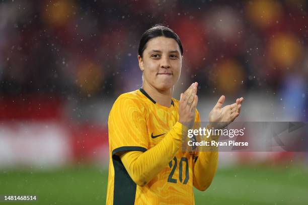 Sam Kerr of Australia applauds their fans after defeating England during the Women's International Friendly match between England and Australia at...