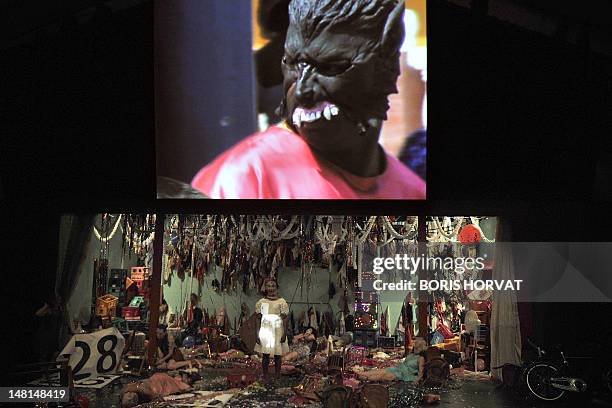 Colombian actor Julian Diaz performs with Mapa Teatro actors from Bogota during a rehearsal of the play "Los Santos Inocentes", first part of a...