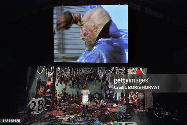 Colombian actor Julian Diaz performs with Mapa Teatro actors from Bogota during a rehearsal of the play "Los Santos Inocentes", first part of a...