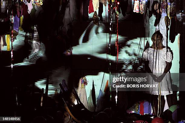 Colombian actor Julian Diaz performs during a rehearsal of the play "Los Santos Inocentes", first part of a tryptic, written by Rolf and Heidi...