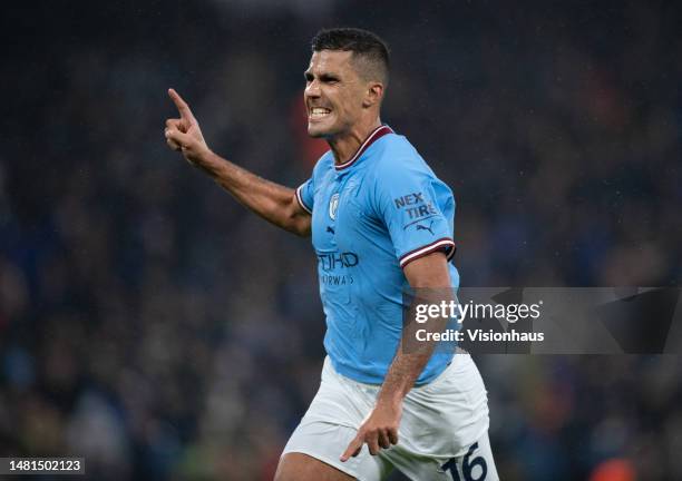 Rodrigo of Manchester City celebrates scoring the first goal with team mate Bernardo Silva during the UEFA Champions League quarter final first leg...