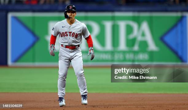 Masataka Yoshida of the Boston Red Sox leads off first in the first inning during a game against the Tampa Bay Rays at Tropicana Field on April 11,...