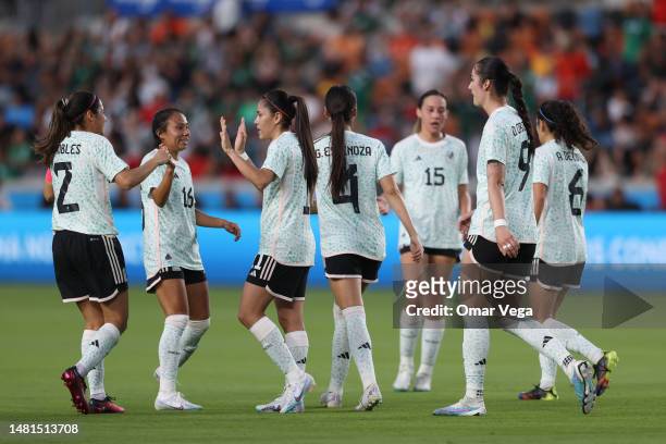 Jacqueline Ovalle of Mexico celebrates after scoring the third goal of his team during friendly match between Mexican Women's National Team and...