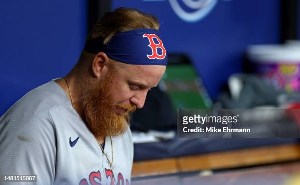 Justin Turner of the Boston Red Sox looks on during a game against the Tampa Bay Rays at Tropicana Field on April 11, 2023 in St Petersburg, Florida.