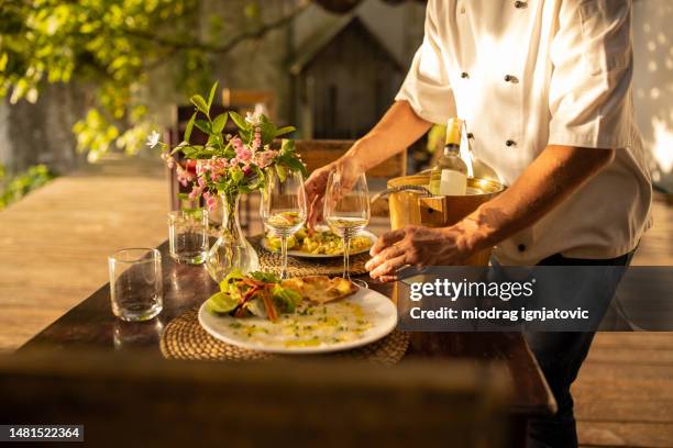 waiter setting the table - italian food and wine stock pictures, royalty-free photos & images