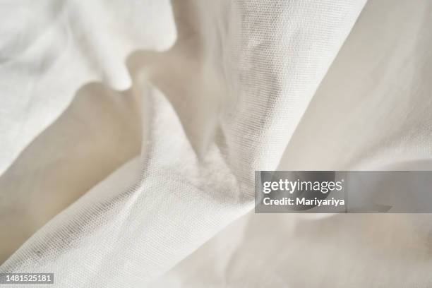 texture of white natural cotton fabric. - garment stock pictures, royalty-free photos & images