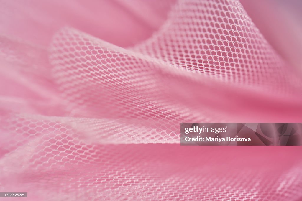 Texture of pink light tulle.