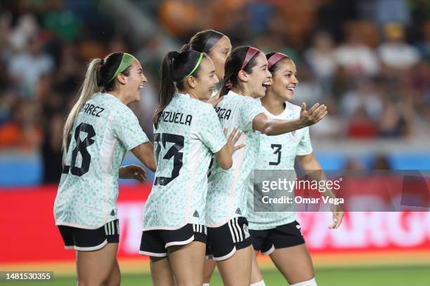 Greta Espinoza of Mexico celebrates with her teammates after scoring the fourth goal of her team during friendly match between Mexican Women's...