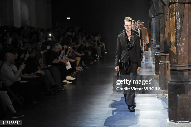 Models walk the runway during the Ann Demeulemeester Ready to Wear Spring/Summer 2013 show as part of the Paris Men Fashion Week on June 29, 2012 in...