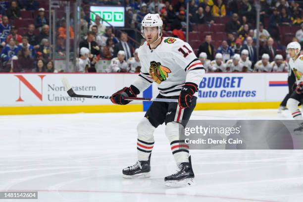 Taylor Raddysh of the Chicago Blackhawks skates up ice during the first period of their NHL game against the Vancouver Canucks at Rogers Arena on...