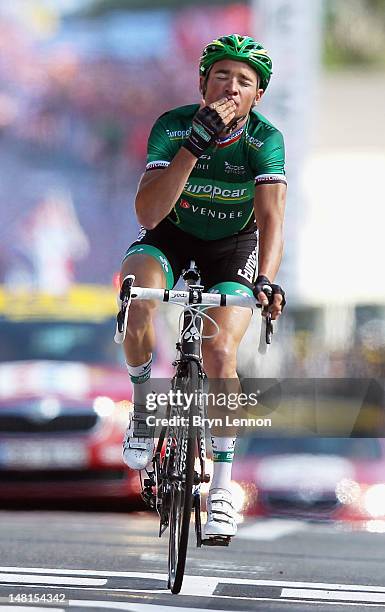 Thomas Voeckler of France and Team Europcar celebrates as he crosses the finish line to win stage ten of the 2012 Tour de France from Macon to...