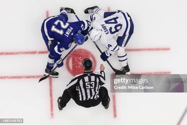 Brayden Point of the Tampa Bay Lightning against David Kampf of the Toronto Maple Leafs during the third period at Amalie Arena on April 11, 2023 in...