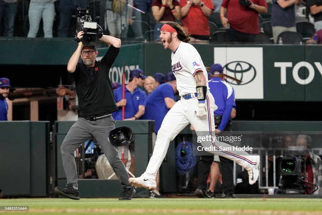 Texas Ranger Heim Jonah Heim of the Texas Rangers runs to home plate after hitting a ...
