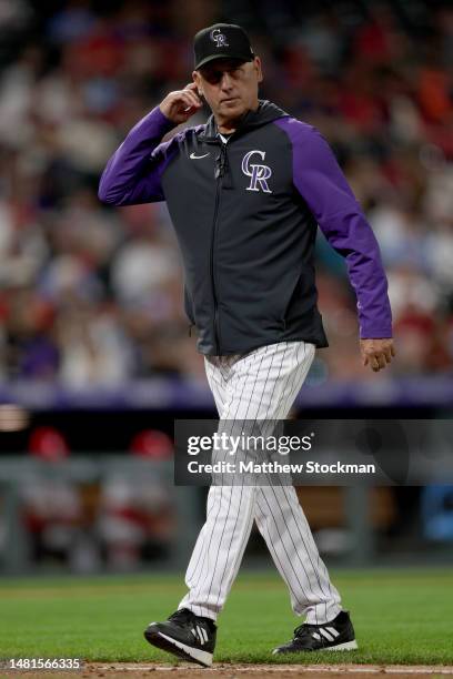 Manager Bud Black of the Colorado Rockies walks back to the dugout after changing pitchers against the St Louis Cardinals in the seventh inning at...