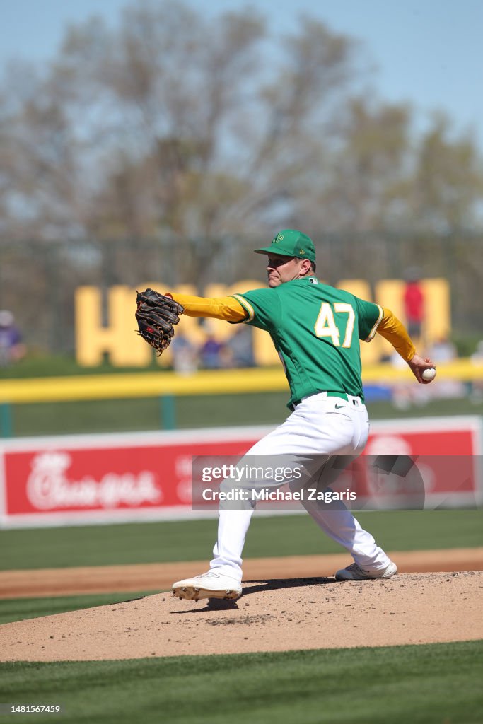 Drew Rucinski Drew Rucinski of the Oakland Athletics pitches during a spring... News ...
