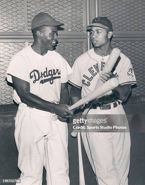 Brooklyn Dodger Jackie Robinson and Cleveland Indian Larry Doby photographed together for the first time.