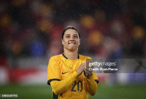 Sam Kerr of Australia applauds their fans after defeating England during the Women's International Friendly match between England and Australia at...