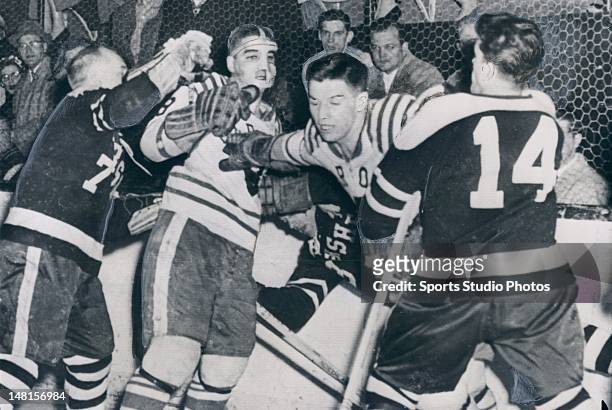 Altercation during the Hershey Bears vs. Cleveland Barons hockey game in the Calder Cup photographed on March 29, 1959.