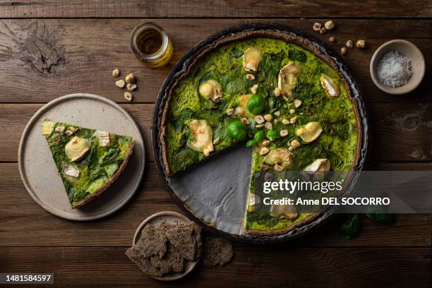 spinach basil and goat cheese homemade tart - spinach pie stock pictures, royalty-free photos & images