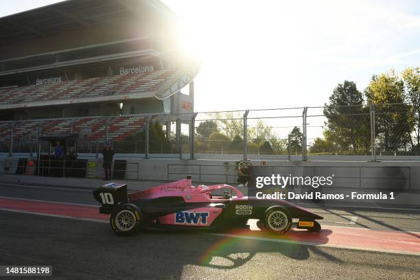 Abbi Pulling of Great Britain and Rodin Carlin drives in the Pitlane during day two of F1 Academy Testing at Circuit de Barcelona-Catalunya on April...