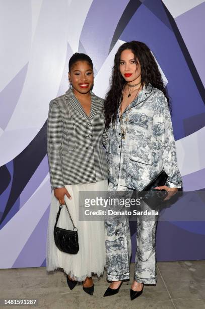 Dominique Fishback and Jurnee Smollett attend Dare In Gris Dior The Grey Zone Opening on April 11, 2023 in Los Angeles, California.