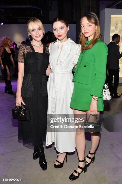 Kiernan Shipka, Samantha Hanratty, and Madeleine Arthur attend Dare In Gris Dior The Grey Zone Opening on April 11, 2023 in Los Angeles, California.