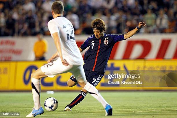 Yuki Otsu of Japan shoots at goal during the international friendly match between Japan U-23 and New Zealand U-23 at the National Stadium on July 11,...