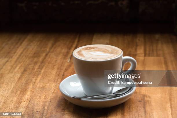 coffee cup top view on old wooden - hand white background stock pictures, royalty-free photos & images