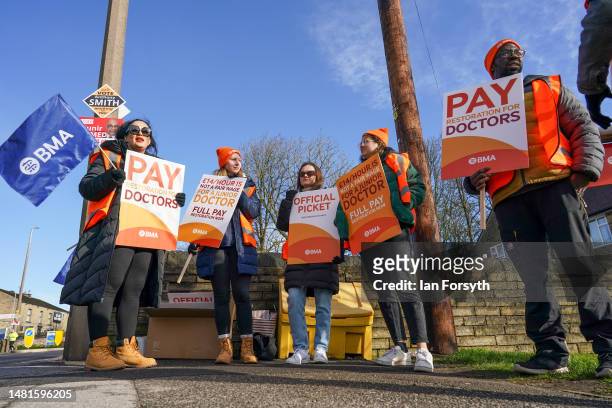 Junior doctors take part in industrial action outside Huddersfield Royal Infirmary on April 12, 2023 in Huddersfield, England. Junior doctors in...
