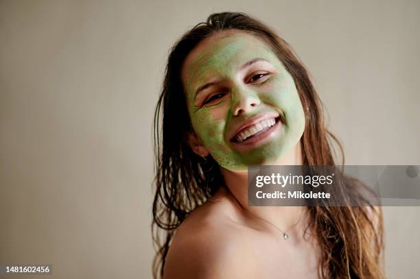 face mask cream, portrait and happy woman for skincare detox, cosmetics hydration or studio beauty. dermatology, spa and person with facial or healthy wellness routine on mockup wall background - facial cleanse stock pictures, royalty-free photos & images