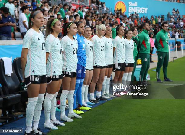 Players of Mexico stand for their national anthem before the friendly match between the Mexican Women's National Team and the Houston Dash at Shell...