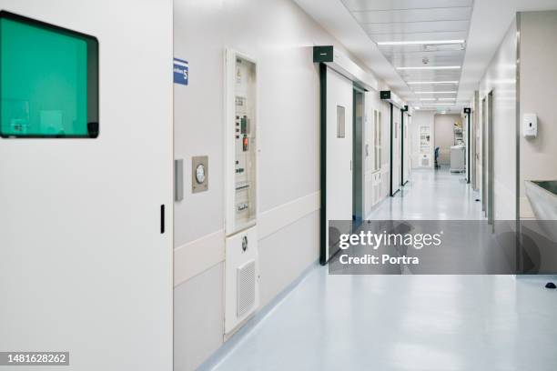 interior of a empty hospital corridor - aesthetic medicine stock pictures, royalty-free photos & images