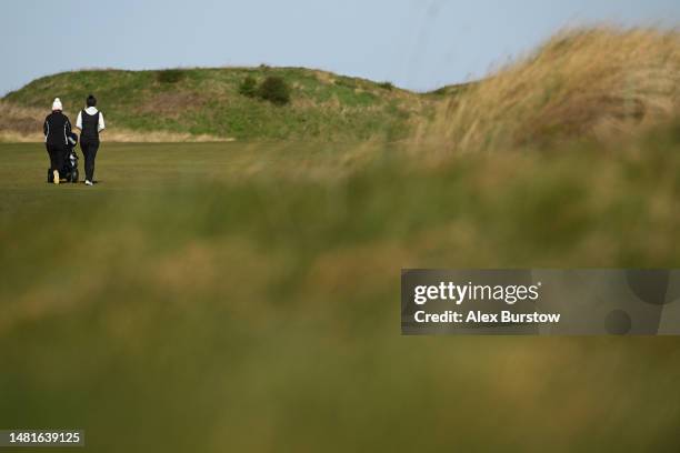 Amy Boulden of Wales and her caddie walk on the first fairway during The Rose Ladies Series at The West Lancashire Golf Club on April 11, 2023 in...