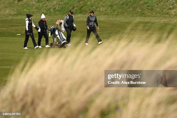 Whitney Hillier of Australia and Amy Boulden of Wales and their caddies walk on the ninth fairway during The Rose Ladies Series at The West...