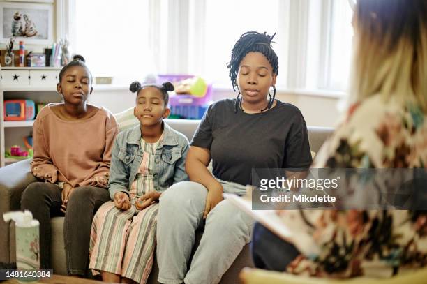 child therapist, breathing activity and family consultation with mother, children and counseling. communication, mom and kids with childcare psychologist talking about girls in discussion about care - respect kids stock pictures, royalty-free photos & images