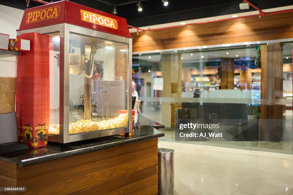 Popcorn maker on concession stand in a movie theater