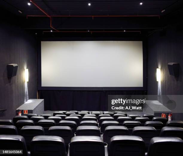 film theater with empty leather seats - film screening stock pictures, royalty-free photos & images