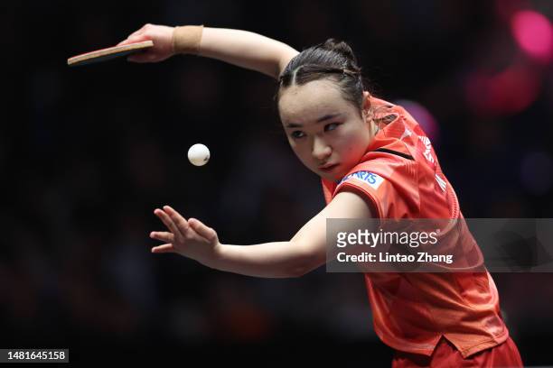 Ito Mima of Japan competes against Bernadette Szocs of Romania in their Women's singles Round of 16 match on day 4 of WTT Champions Xinxiang 2023 at...