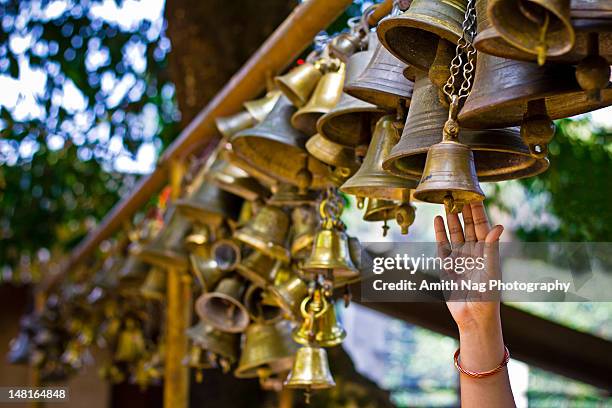 bells and blessings - indian temples stock pictures, royalty-free photos & images