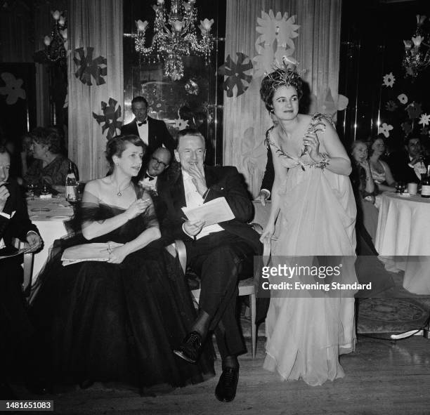 British actress Dame Peggy Ashcroft , tenor Peter Pears and concert pianist Marion Stein, Lady Harewood , attending the Opera Ball at the Dorchester...